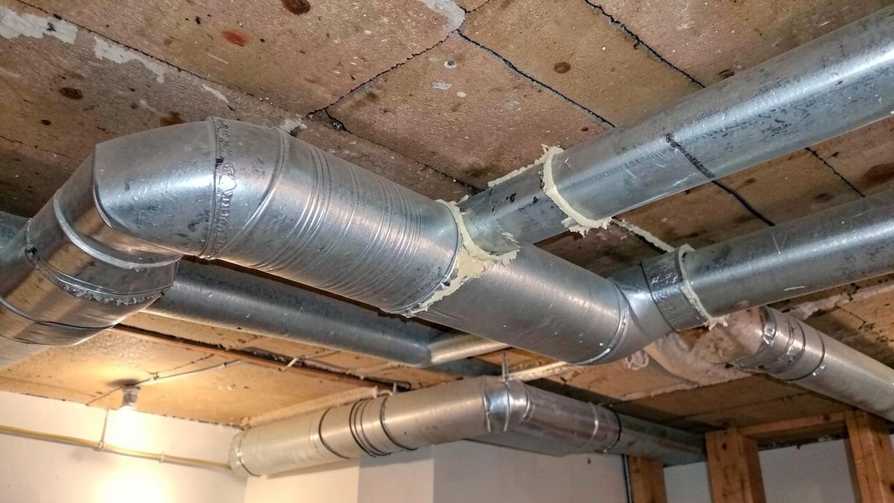 Editorial photograph illustrating duct leakage and balancing uneven rooms