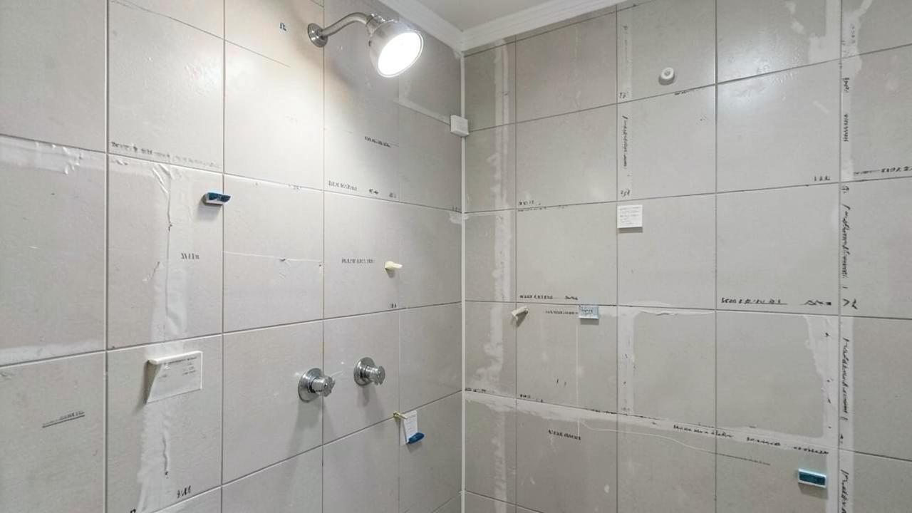 Editorial photograph illustrating how to tile a shower or wet area correctly