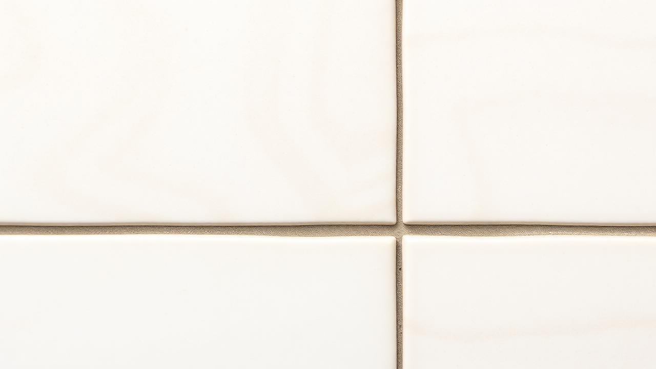 Tile spacers setting grout joint width between tiles